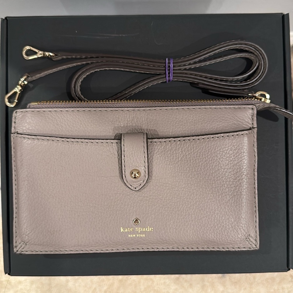 Kate Spade Crossbody bag/wallet with detachable handle. Color is pebble stone
